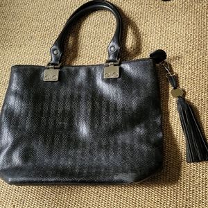 Black leather tote w silver hardware.